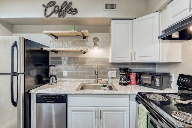 kitchen with backsplash, stainless steel appliances, under cabinet range hood, and a sink