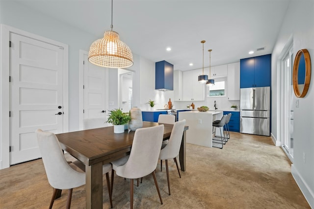 view of carpeted dining space