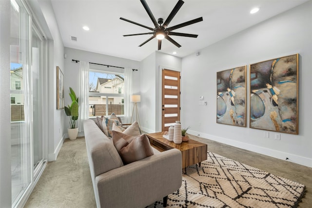 living room featuring ceiling fan