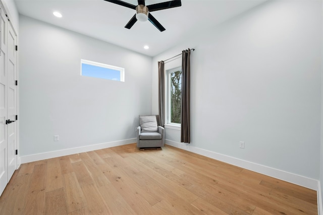 unfurnished room with light hardwood / wood-style floors and ceiling fan