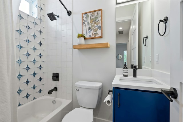 full bathroom featuring vanity, toilet, and shower / tub combo