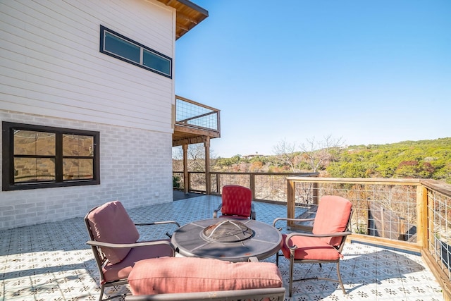 view of patio with a balcony