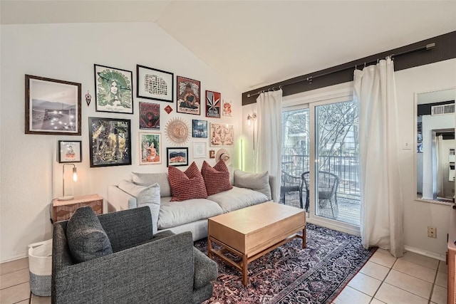 tiled living room featuring vaulted ceiling