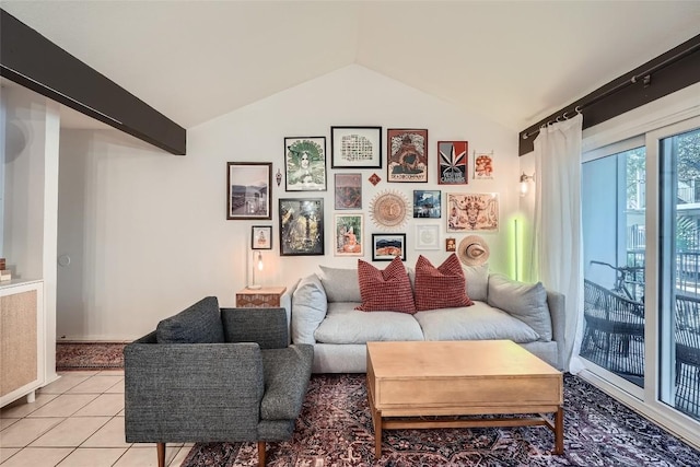 tiled living room featuring lofted ceiling with beams