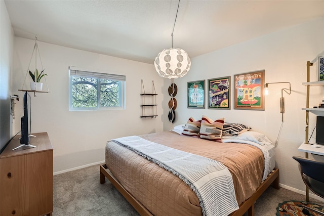 bedroom featuring light carpet