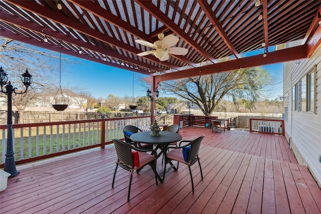 wooden deck featuring ceiling fan