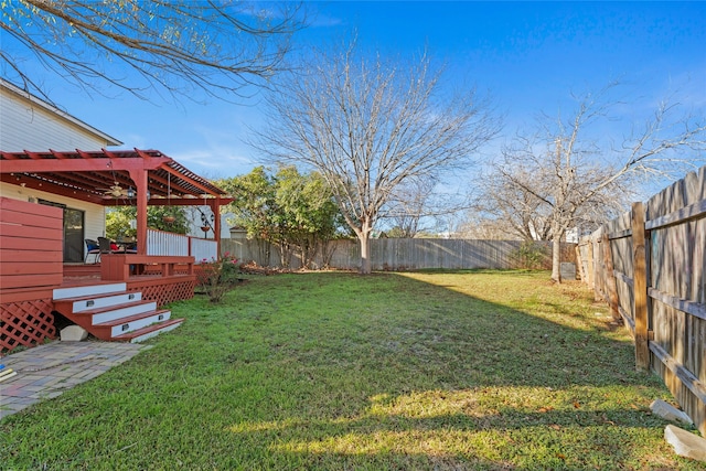 view of yard with a wooden deck