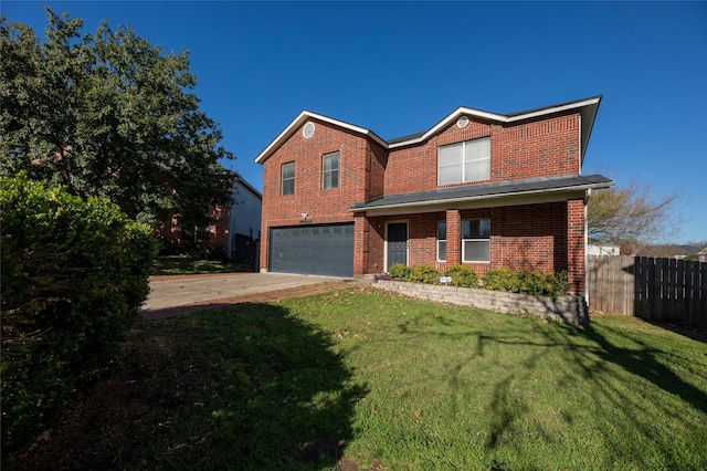 view of front of property featuring a garage and a front lawn