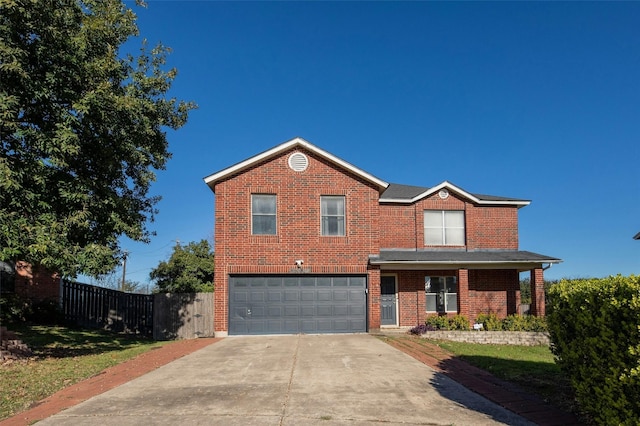 front of property with a garage