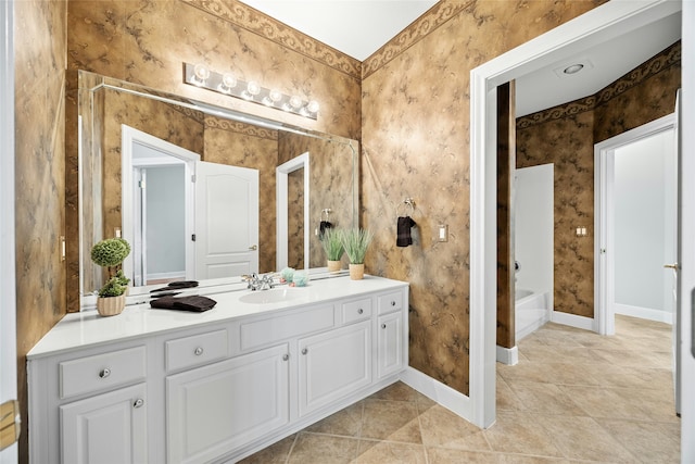 bathroom featuring tile patterned flooring, vanity, and bathing tub / shower combination