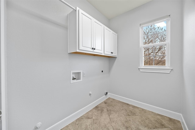 clothes washing area with gas dryer hookup, hookup for a washing machine, cabinets, and electric dryer hookup