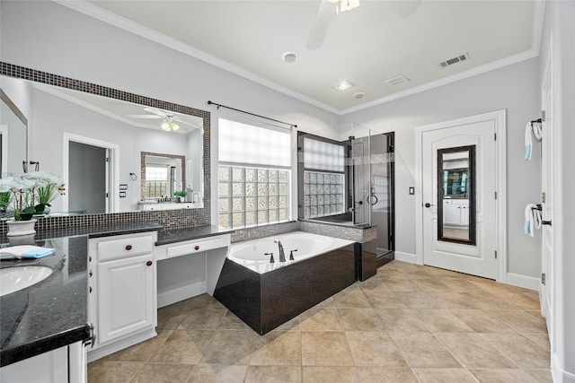 bathroom with ceiling fan, vanity, ornamental molding, and independent shower and bath