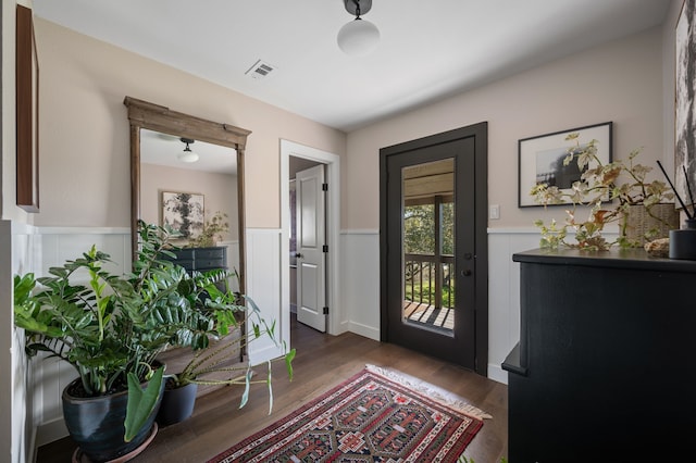 entryway with dark hardwood / wood-style floors