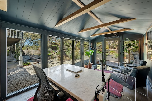 sunroom / solarium with lofted ceiling with beams