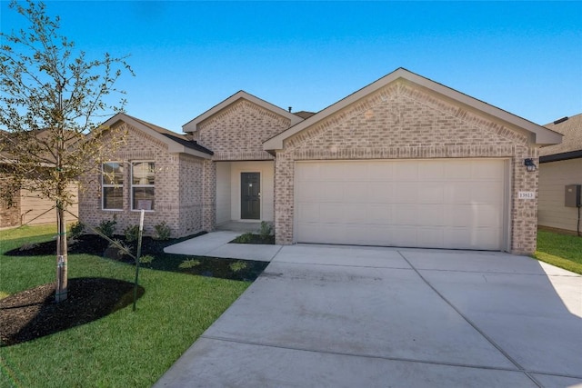 view of front of house with a garage and a front yard