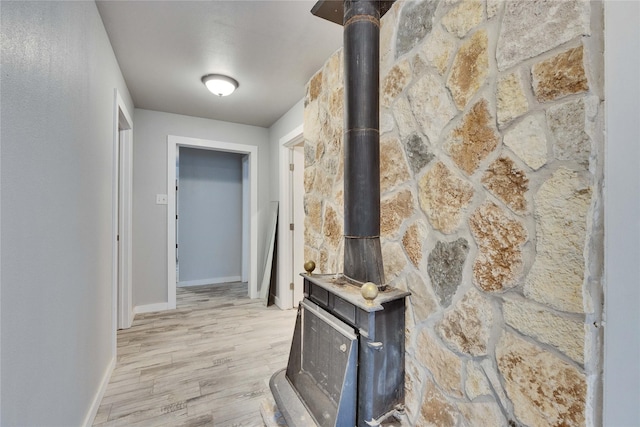 corridor featuring light hardwood / wood-style floors