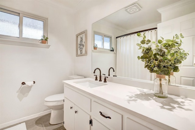 bathroom featuring crown molding, toilet, tile patterned flooring, and vanity