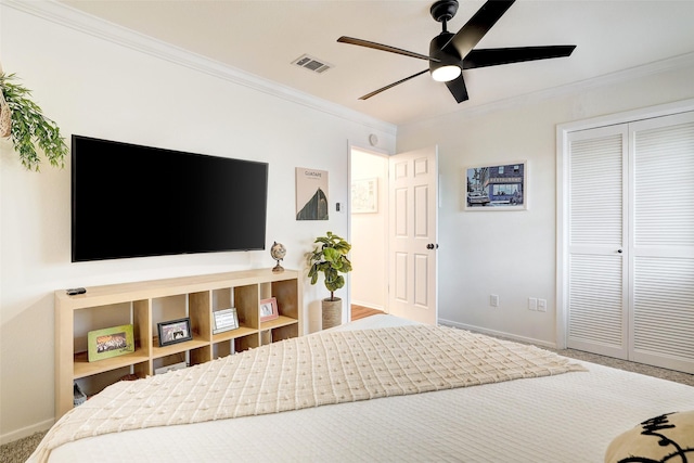 bedroom with ceiling fan and ornamental molding