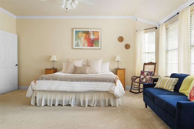 bedroom featuring vaulted ceiling, crown molding, and light colored carpet