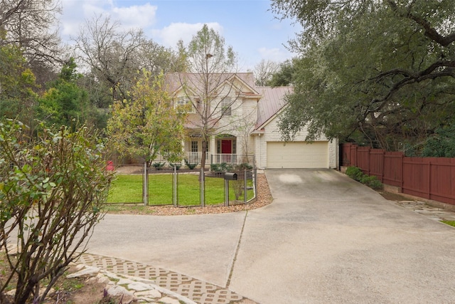 view of front facade with a front yard and a garage