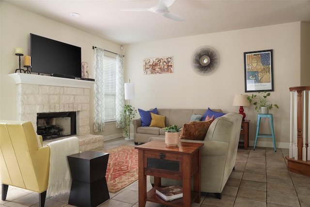 living room with tile patterned flooring and ceiling fan