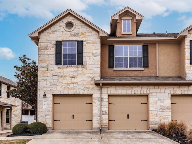 view of property featuring a garage