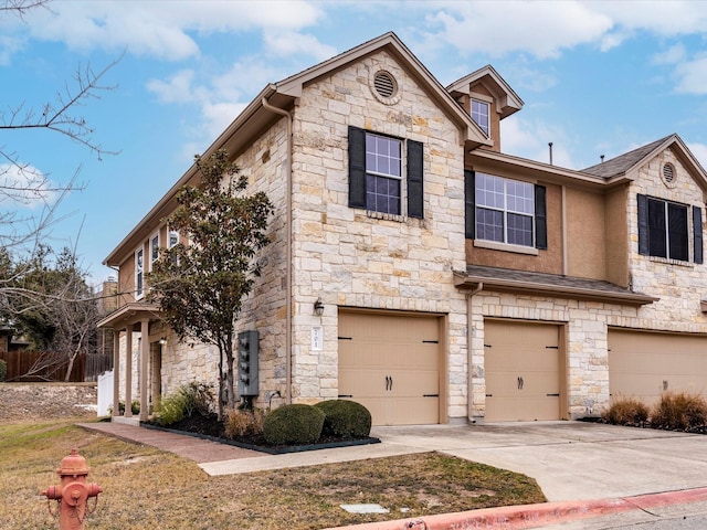 view of front of property featuring a garage