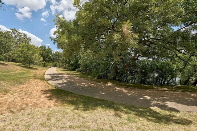 surrounding community featuring a lawn