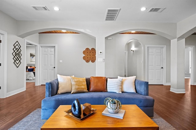 living room featuring dark hardwood / wood-style floors