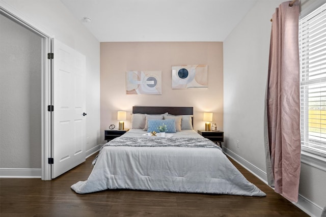 bedroom featuring dark hardwood / wood-style floors