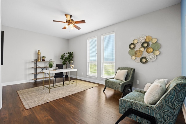 office area featuring a healthy amount of sunlight, dark hardwood / wood-style floors, and ceiling fan