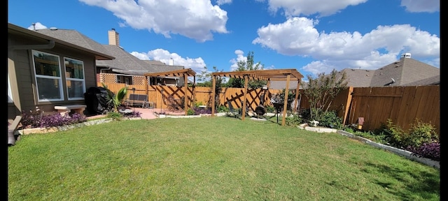 view of yard with a fenced backyard and a pergola