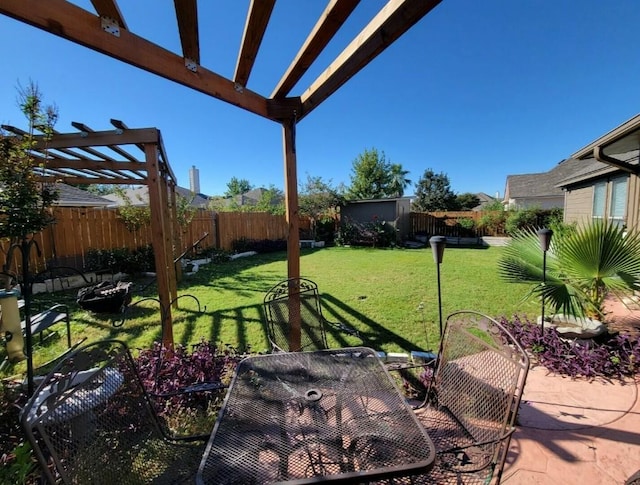 view of yard featuring a patio area, outdoor dining area, a fenced backyard, and a pergola