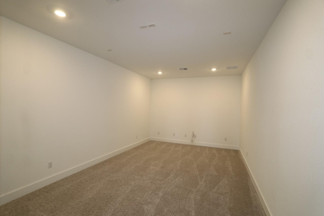 empty room featuring carpet floors