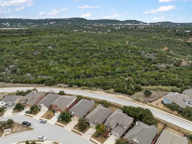 birds eye view of property featuring a mountain view