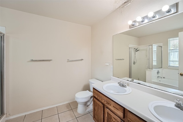 full bathroom featuring toilet, shower with separate bathtub, vanity, and tile patterned flooring