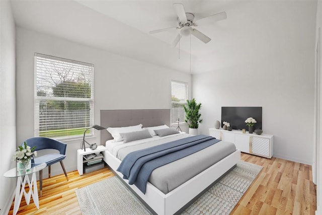 bedroom with ceiling fan and wood finished floors