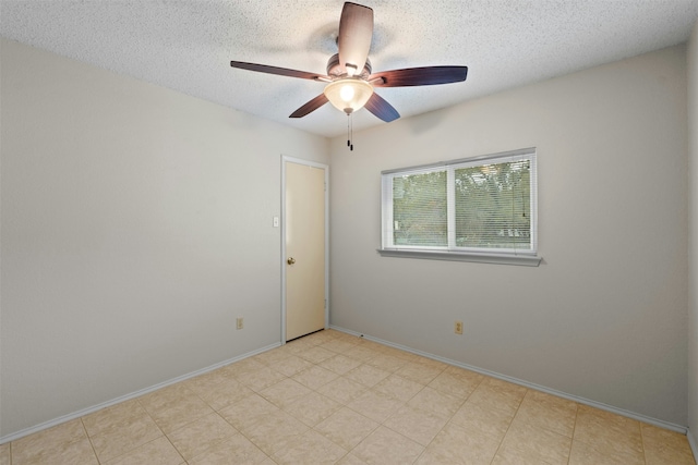 unfurnished room with a textured ceiling and ceiling fan