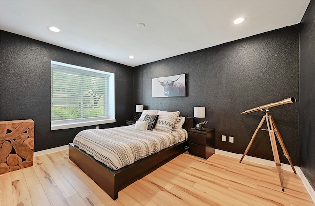 bedroom featuring light hardwood / wood-style flooring