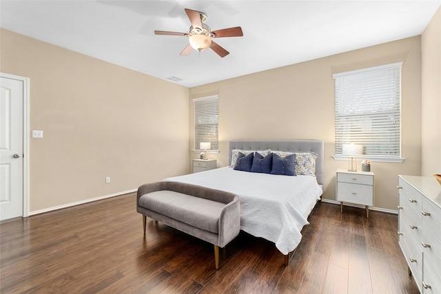 bedroom featuring ceiling fan and dark hardwood / wood-style floors