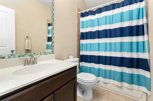 full bathroom with toilet, shower / bath combo with shower curtain, tile patterned flooring, vanity, and vaulted ceiling