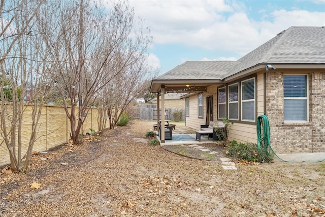 9201 Bentley Garner Ln, Austin, TX 78748 - fenced backyard with a patio area