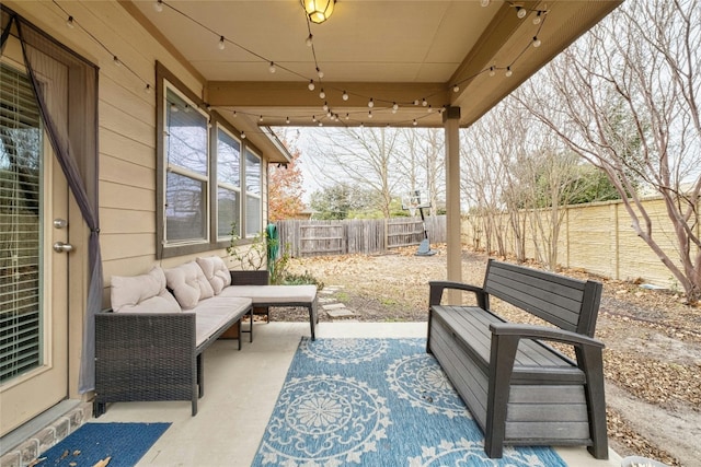 9201 Bentley Garner Ln, Austin, TX 78748 - fenced backyard with a patio and an outdoor hangout area