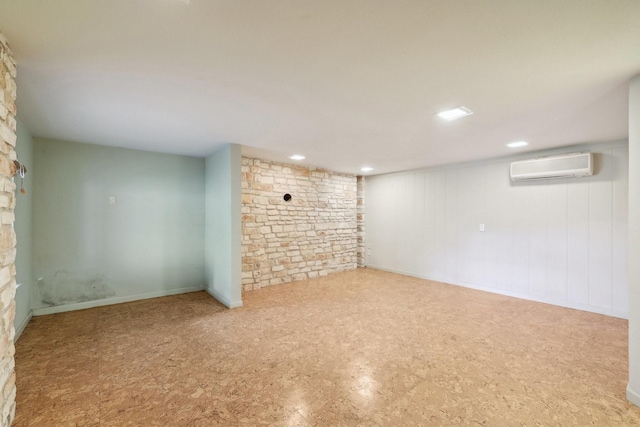 basement featuring an AC wall unit