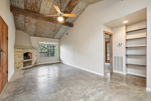 unfurnished living room featuring concrete floors, beamed ceiling, a fireplace, high vaulted ceiling, and ceiling fan