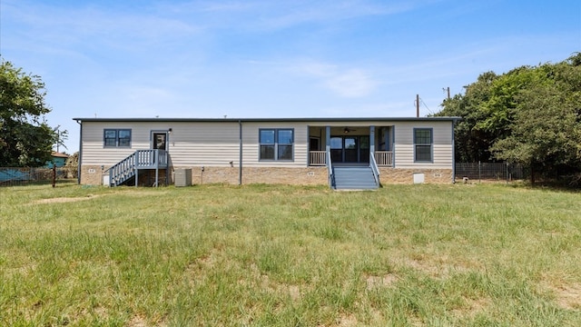 view of front facade featuring a front yard