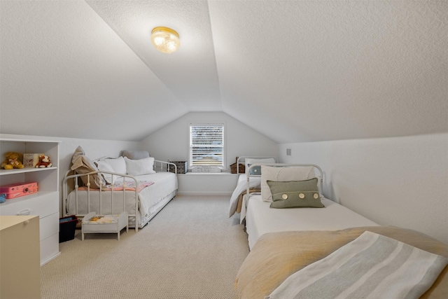 bedroom featuring a textured ceiling, light carpet, and lofted ceiling