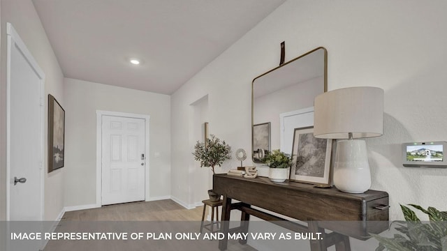 entryway with light hardwood / wood-style flooring