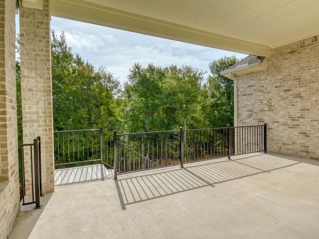 view of patio with a balcony