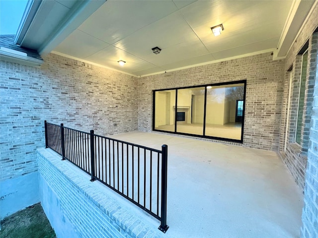 view of patio with a balcony